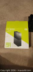 MaxSold Auction: My Book 4TB Desktop External Hard Drive - Toronto (Ontario, Canada) SELLER MANAGED Downsizing Online Auction -  Pilkington Drive