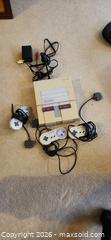 MaxSold Auction: Super Nintendo Entertainment System with 3 controllers  - Toronto (Ontario, Canada) SELLER MANAGED Downsizing Online Auction -  Pilkington Drive