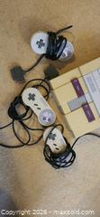 MaxSold Auction: Super Nintendo Entertainment System with 3 controllers  - Toronto (Ontario, Canada) SELLER MANAGED Downsizing Online Auction -  Pilkington Drive