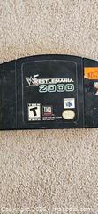 MaxSold Auction: This is a cartridge for the WWF WrestleMania 2000 Nintendo 64 console.  - Toronto (Ontario, Canada) SELLER MANAGED Downsizing Online Auction -  Pilkington Drive