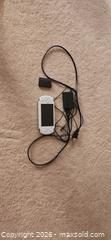 MaxSold Auction: White Sony PlayStation Portable (PSP)  - Toronto (Ontario, Canada) SELLER MANAGED Downsizing Online Auction -  Pilkington Drive
