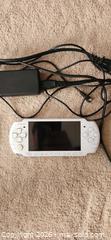 MaxSold Auction: White Sony PlayStation Portable (PSP)  - Toronto (Ontario, Canada) SELLER MANAGED Downsizing Online Auction -  Pilkington Drive