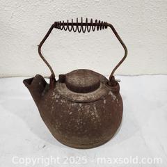 MaxSold Auction: Antique Cast Iron Teapot and Griswold Corn Tray - Sacramento (California, USA) SELLER MANAGED Reseller Online Auction - Arden Way