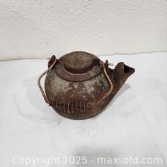 MaxSold Auction: Antique Cast Iron Teapot and Griswold Corn Tray - Sacramento (California, USA) SELLER MANAGED Reseller Online Auction - Arden Way