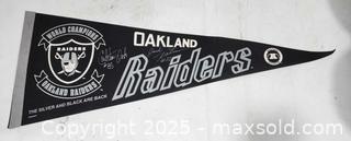 MaxSold Auction: Oakland Raiders Team Pennant - Signed by Jack Tatum and Carleton Oats - Lot A - Sacramento (California, USA) SELLER MANAGED Reseller Online Auction - Arden Way