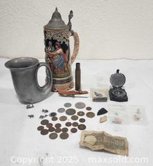 MaxSold Auction: Swiss Music Box Beer Stein, Pewter Pitcher & Foreign Coins Lot - Sacramento (California, USA) SELLER MANAGED Reseller Online Auction - Arden Way