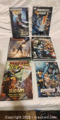 MaxSold Auction: Lot of 6 Marvel Hardcover Collected Editions - Toronto (Ontario, Canada) SELLER MANAGED Downsizing Online Auction - Rutherford Avenue