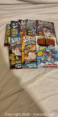 MaxSold Auction: Lot of 8 Children&#39;s Paperback Books: Captain Underpants &#38; Ricky Ricotta - Toronto (Ontario, Canada) SELLER MANAGED Downsizing Online Auction - Rutherford Avenue