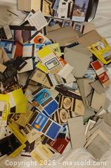 MaxSold Auction: Mixed Matchbook Collection — 500+ Pieces with Metal Tin - Toronto (Ontario, Canada) SELLER MANAGED Downsizing Online Auction - Rutherford Avenue