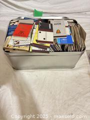 MaxSold Auction: Mixed Matchbook Collection — 500+ Pieces with Metal Tin - Toronto (Ontario, Canada) SELLER MANAGED Downsizing Online Auction - Rutherford Avenue