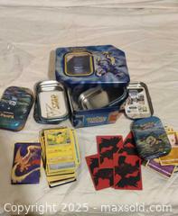 MaxSold Auction: Pokémon Card Lot with 2–3 Storage Tins, 50–100 Cards - Toronto (Ontario, Canada) SELLER MANAGED Downsizing Online Auction - Rutherford Avenue