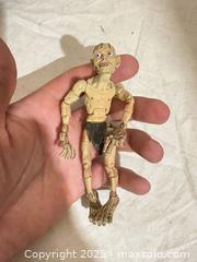 MaxSold Auction: Two Collectible Hobbit-Style Figures with Diorama Base - Toronto (Ontario, Canada) SELLER MANAGED Downsizing Online Auction - Rutherford Avenue