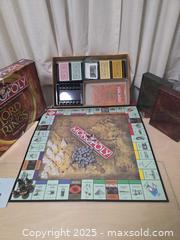 MaxSold Auction: LOTR Monopoly Game & Lord of the rings DVD Box Sets - Vancouver (British Columbia, Canada) PARTNER MANAGED Downsizing Online Auction - Montcalm Street (CONDO)