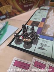 MaxSold Auction: LOTR Monopoly Game & Lord of the rings DVD Box Sets - Vancouver (British Columbia, Canada) PARTNER MANAGED Downsizing Online Auction - Montcalm Street (CONDO)
