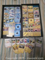 MaxSold Auction: Pokémon Cards  - Vancouver (British Columbia, Canada) PARTNER MANAGED Downsizing Online Auction - Montcalm Street (CONDO)