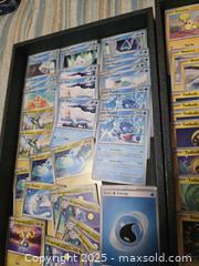 MaxSold Auction: Pokémon Cards  - Vancouver (British Columbia, Canada) PARTNER MANAGED Downsizing Online Auction - Montcalm Street (CONDO)