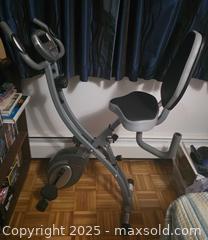 MaxSold Auction: Sunny Health & Fitness Stationary Bicycle / Excercise Bike - Vancouver (British Columbia, Canada) PARTNER MANAGED Downsizing Online Auction - Montcalm Street (CONDO)