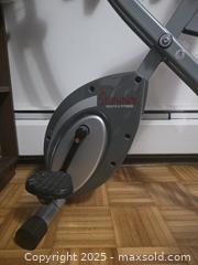MaxSold Auction: Sunny Health & Fitness Stationary Bicycle / Excercise Bike - Vancouver (British Columbia, Canada) PARTNER MANAGED Downsizing Online Auction - Montcalm Street (CONDO)