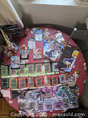 MaxSold Auction: Yugioh battle boards & Mats and rule books - Vancouver (British Columbia, Canada) PARTNER MANAGED Downsizing Online Auction - Montcalm Street (CONDO)