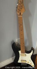 MaxSold Auction: B.C. Rich Signature Strat-Style Electric Guitar — Sharp Look, Smooth Feel, Excellent Playe - Newmarket (Ontario, Canada) SELLER MANAGED Downsizing Online Auction - Brimson Drive (STORAGE)