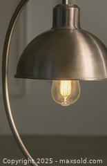 MaxSold Auction: Vintage Brushed Steel Arc Table Lamp — Modern Industrial Elegance - Newmarket (Ontario, Canada) SELLER MANAGED Downsizing Online Auction - Brimson Drive (STORAGE)