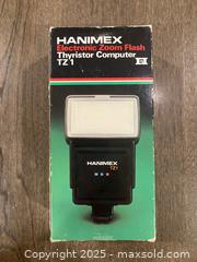 MaxSold Auction: Camera Flash - Ottawa (Ontario, Canada) SELLER MANAGED Downsizing Online Auction - Zephyr Avenue