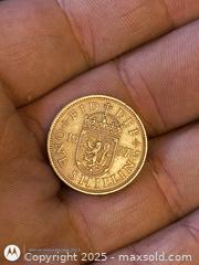 MaxSold Auction: 1957 one Shilling England - South Frontenac (Ontario, Canada) SELLER MANAGED Downsizing Online Auction - Battersea Road