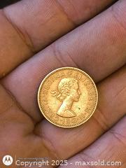 MaxSold Auction: 1957 one Shilling England - South Frontenac (Ontario, Canada) SELLER MANAGED Downsizing Online Auction - Battersea Road