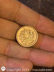 MaxSold Auction: 1 pound coin of england - South Frontenac (Ontario, Canada) SELLER MANAGED Downsizing Online Auction - Battersea Road