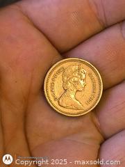 MaxSold Auction: 1 pound coin of england - South Frontenac (Ontario, Canada) SELLER MANAGED Downsizing Online Auction - Battersea Road