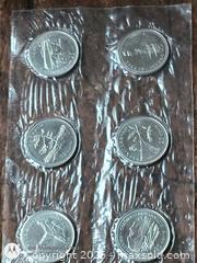 MaxSold Auction: Mint 25 Cents Coins in holders  - South Frontenac (Ontario, Canada) SELLER MANAGED Downsizing Online Auction - Battersea Road