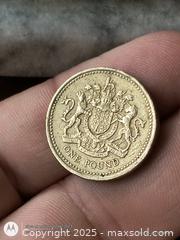 MaxSold Auction: One Pound Coin of England  - South Frontenac (Ontario, Canada) SELLER MANAGED Downsizing Online Auction - Battersea Road