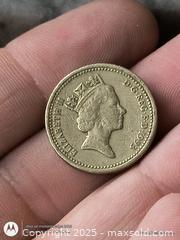 MaxSold Auction: One Pound Coin of England  - South Frontenac (Ontario, Canada) SELLER MANAGED Downsizing Online Auction - Battersea Road