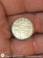 MaxSold Auction: Rainbow Gasoline Toned 1927 5 cent coin - South Frontenac (Ontario, Canada) SELLER MANAGED Downsizing Online Auction - Battersea Road
