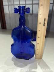 MaxSold Auction: Lot: 3 Cobalt Violin-Shaped Glass Bottles and Matching Plate - Warwick (Rhode Island, USA) SELLER MANAGED Reseller Online Auction - Warwick Avenue