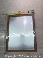 MaxSold Auction: Tin Board with Brown Wood Frame, Plastic Containers  - Warwick (Rhode Island, USA) SELLER MANAGED Reseller Online Auction - Warwick Avenue