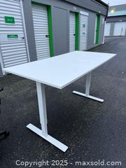 MaxSold Auction: Height-Adjustable Sit-Stand Desk, White Laminate Top 60 x 30 - Maple Ridge (British Columbia, Canada) SELLER MANAGED Estate Sale Online Auction - Blanshard Street (STORAGE)