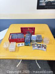 MaxSold Auction: Mixed Lot of 100–200 Standard Cases for Trading Card Protective Holder Sleeves (Clear) - Maple Ridge (British Columbia, Canada) PARTNER MANAGED Estate Sale Online Auction - Blanshard Street (STORAGE)