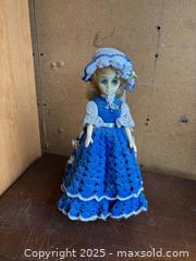 MaxSold Auction: Porcelain Collectible Display Doll with Crocheted Dress, 11–13 in - Maple Ridge (British Columbia, Canada) PARTNER MANAGED Estate Sale Online Auction - Blanshard Street (STORAGE)