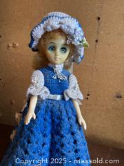 MaxSold Auction: Porcelain Collectible Display Doll with Crocheted Dress, 11–13 in - Maple Ridge (British Columbia, Canada) PARTNER MANAGED Estate Sale Online Auction - Blanshard Street (STORAGE)