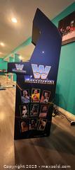MaxSold Auction: Upright WWE WrestleFest Arcade Cabinet (Dedicated) - Maple Ridge (British Columbia, Canada) SELLER MANAGED Estate Sale Online Auction - Blanshard Street (STORAGE)