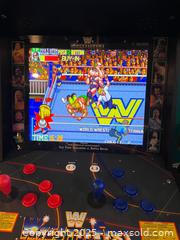 MaxSold Auction: Upright WWE WrestleFest Arcade Cabinet (Dedicated) - Maple Ridge (British Columbia, Canada) SELLER MANAGED Estate Sale Online Auction - Blanshard Street (STORAGE)