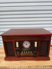 MaxSold Auction: Vintage-style Tabletop Record Player & Radio Console, Cherry - Maple Ridge (British Columbia, Canada) PARTNER MANAGED Estate Sale Online Auction - Blanshard Street (STORAGE)