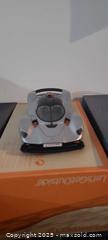 MaxSold Auction: Aston Martin Valkyrie 1:18 Static Model Car, Silver/Black/Orange - Toronto (Ontario, Canada) SELLER MANAGED Downsizing Online Auction - Wilson Avenue (CONDO)