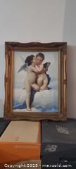 MaxSold Auction: Framed baby cherubs painting in wood frame, approximately 19.5 x 15 in - Toronto (Ontario, Canada) SELLER MANAGED Downsizing Online Auction - Wilson Avenue (CONDO)