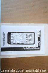 MaxSold Auction: UEI TRUE RMS Digital Multimeter - Orlando (Florida, USA) SELLER MANAGED Downsizing Online Auction - Preserve Dr.