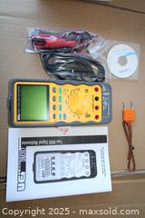 MaxSold Auction: UEI TRUE RMS Digital Multimeter - Orlando (Florida, USA) SELLER MANAGED Downsizing Online Auction - Preserve Dr.