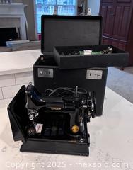 MaxSold Auction: Antique portable sewing machine - Suwanee (Georgia, USA) SELLER MANAGED Estate Sale Online Auction - Laurel Oak Drive