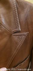 MaxSold Auction: LEATHER Coat By Elegance - Large-X-Large - Vancouver (British Columbia, Canada) PARTNER MANAGED Commercial Liquidation Online Auction - East Hastings