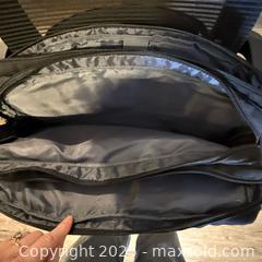 MaxSold Auction: Modern Mesh Ergonomic Office Chair and Messenger Bag - Delta (British Columbia, Canada) SELLER MANAGED Downsizing Online Auction -  Garrett Drive